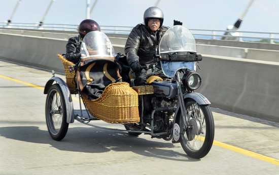 Man On Harley Davidson Motorcycle In Oldest Continuous