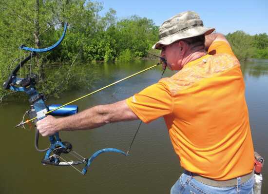 Story: Jim Billman takes aggressive approach toward fishing with compound  bow (6/5/17)
